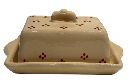 Butter dish cream with red points