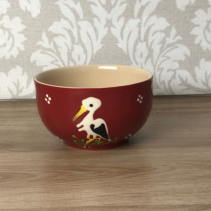 Bowl red with stork
